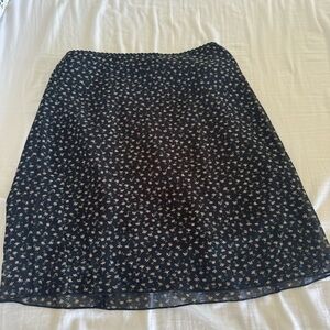 Brandy Melville black floral mini skirt
